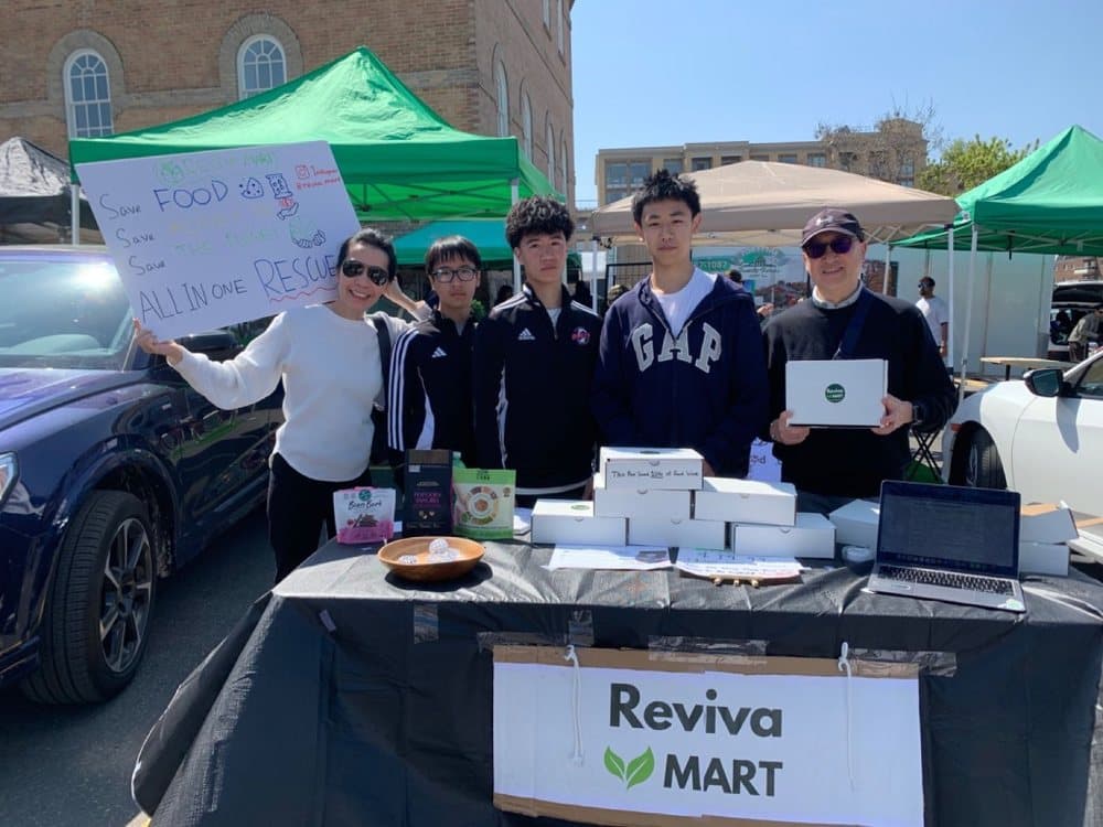The Reviva Mart team at a farmers market booth